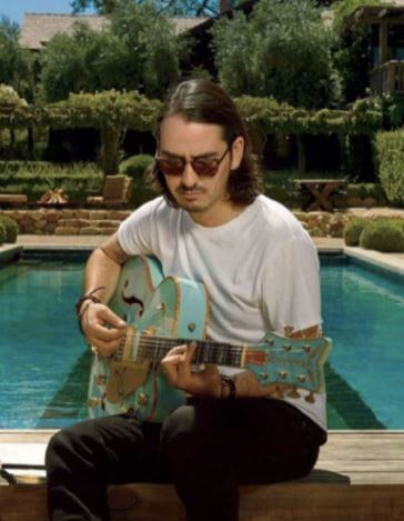 Dhani with his guitar 